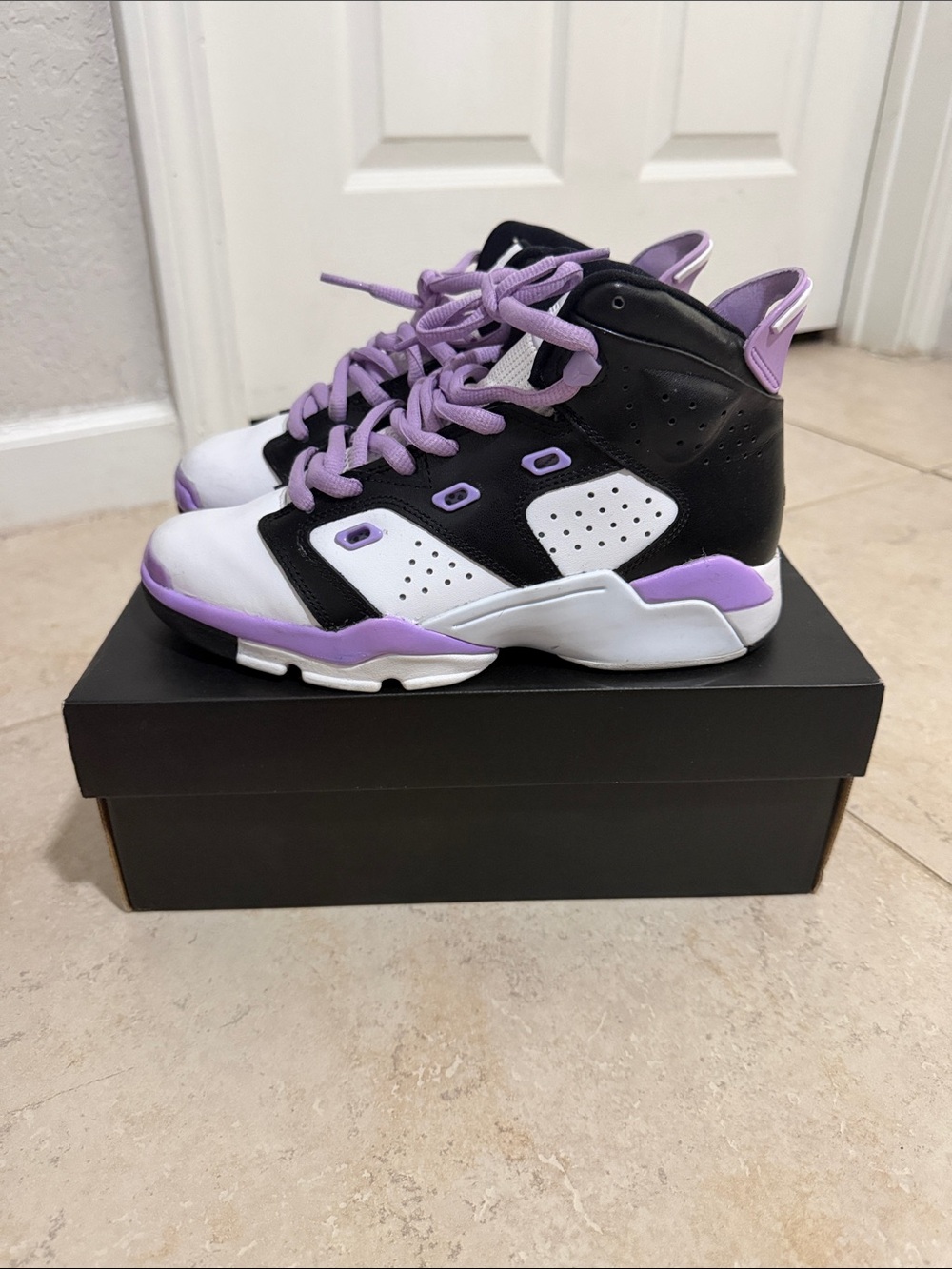 High-Top Kids Jordan’s in Black, White & Lavender